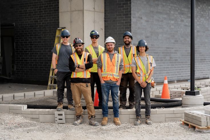 Bedrock Construction crew reviewing site plans